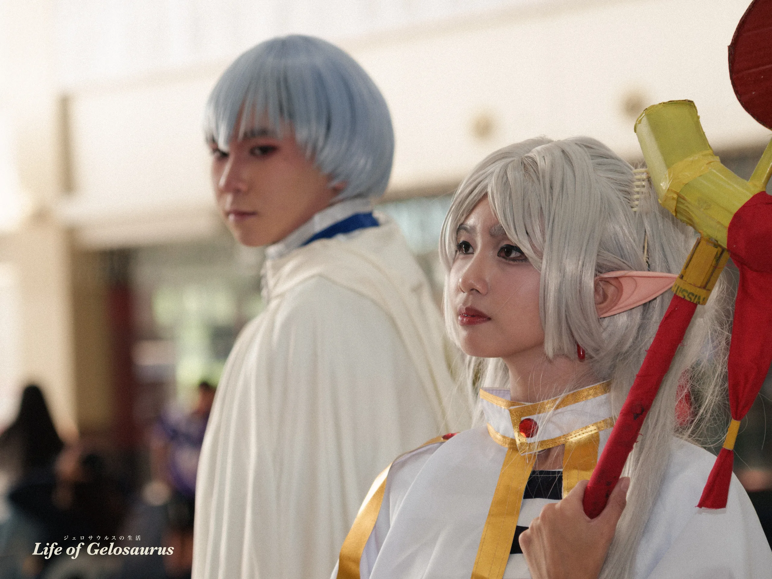 Frieren and Himmel cosplayers photographed together at Robinsons GenSan.